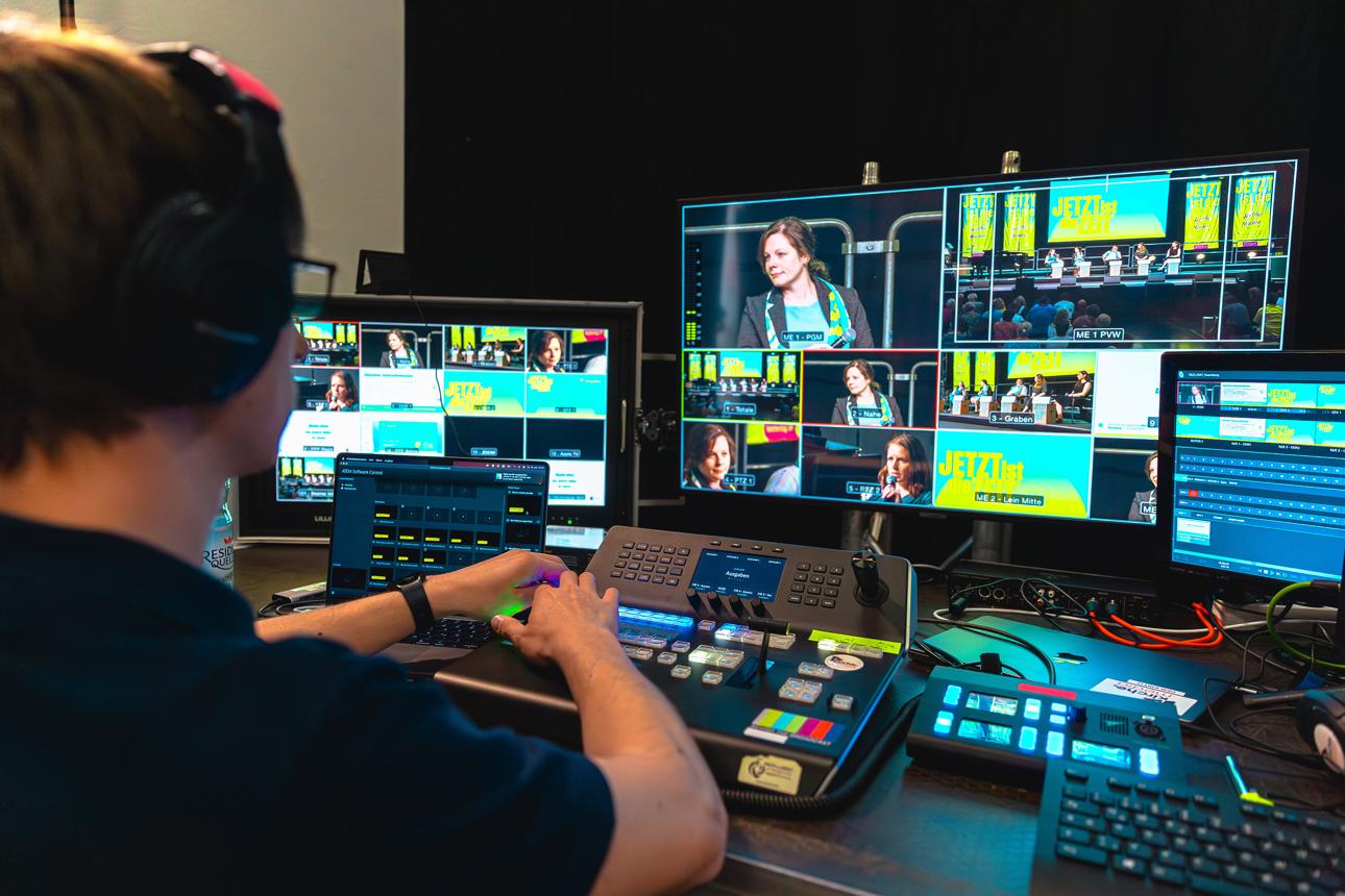 Expert interview video production team filming a business executive in Munich.